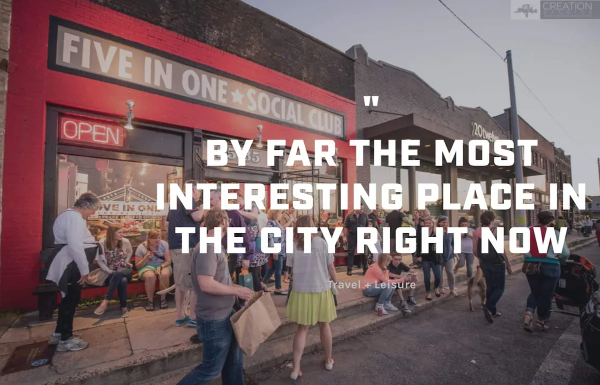 A lively crowd gathers around the Five In One Social Club sign, with an open door and an inviting outdoor seating area. The energy suggests socializing, dining, and community events, reflecting the district's dynamic cultural scene.